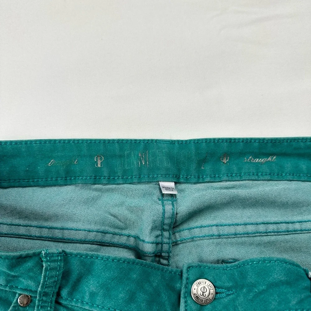 JLo straight jeans. Stretchy. Teal with zipper at ankle. Size 12